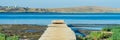 Old wooden jetty or pier at a lake or sea Royalty Free Stock Photo