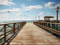 Old wooden jetty at a sea with blue sky a background Royalty Free Stock Photo