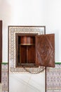 Old wooden lathe giratory to pass objects from one part to another in a cloistered convent