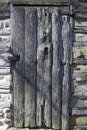 Old wooden log cabin door Royalty Free Stock Photo
