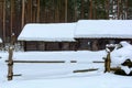 Old wooden log house covered with snow Royalty Free Stock Photo