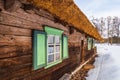 Old Wooden Log House with Window Shutters and Door Royalty Free Stock Photo