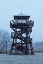 Old wooden lookout tower a foggy day