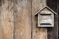Old wooden mailbox with old vintage wooden Royalty Free Stock Photo
