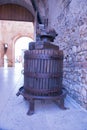 Old wooden manual press used to press the grapes and make wine Royalty Free Stock Photo