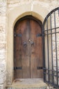 Old wooden massive door on church Royalty Free Stock Photo