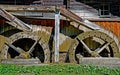 Old wooden mill with two overshot waterwheels