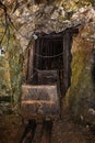 Old wooden mine chart in abandoned mine shaft with wooden timbering