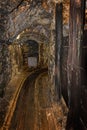 Old wooden mine chart in abandoned mine shaft with wooden timbering Royalty Free Stock Photo