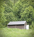 Old wooden mountain hut in a forest Royalty Free Stock Photo