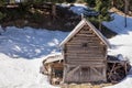 Old wooden mountain hut in mountain pasture Vodicni vrh Royalty Free Stock Photo