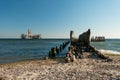 Old wooden pails in the sea Royalty Free Stock Photo