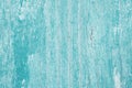 Old wooden painted background in turquoise color.