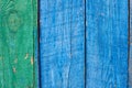 Old wooden painted blue rustic background, paint peeling