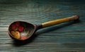 Old wooden painting handicraft style spoons on a wooden background Royalty Free Stock Photo