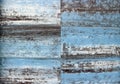 Old wooden panels with two layers of paint, the first blue and the second white, peeling from the  time Royalty Free Stock Photo