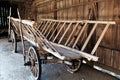 Old wooden peasant wagon parked in a shed Royalty Free Stock Photo