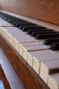 Old wooden piano with bent keys Royalty Free Stock Photo