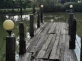 Old wooden pier footbridge by lake Royalty Free Stock Photo