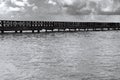 Old wooden pier goes to sea Royalty Free Stock Photo