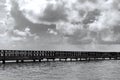 Old wooden pier goes to sea Royalty Free Stock Photo