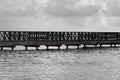 Old wooden pier goes to sea Royalty Free Stock Photo