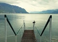 Old wooden pier on Lake Geneva Royalty Free Stock Photo