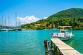 Old wooden pier Nydri town marina summer view Lefkada island Greece Royalty Free Stock Photo