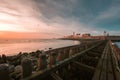 Old wooden pier by the sea under the beautiful cloudy sky captured in Vlissingen, Netherlands Royalty Free Stock Photo