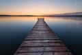 Old wooden pier at sunset. Long exposure Royalty Free Stock Photo