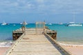 Old wooden pier and yachts, Punta Cana, Dominican Republic Royalty Free Stock Photo