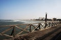 old wooden pier with railing in the pacific ocean and blue sky pimentel chiclayo per