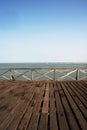 old wooden pier with railing in the pacific ocean and blue sky pimentel chiclayo per