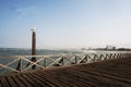 old wooden pier with railing in the pacific ocean and blue sky pimentel chiclayo per