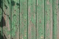 Old wooden plank background. Peeling, faded sea-green paint on the old boards. Copying space Royalty Free Stock Photo