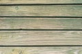 Old wooden plank background. Peeling green paint on old boards. Copy space Royalty Free Stock Photo