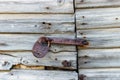 Close up of old wooden garage door with padlock Royalty Free Stock Photo