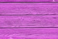 Old wooden planks painted bright pink. vintage style, horizontal stripe Royalty Free Stock Photo
