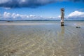 Old wooden post in sea Royalty Free Stock Photo