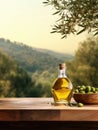 Old wooden product display table with natural green olive field and olive oil