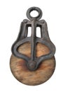 Old wooden pulley isolated. Royalty Free Stock Photo