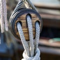 Old wooden pulley with ropes on a sailing ship Royalty Free Stock Photo