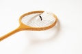Old wooden racket and shuttlecock closeup on a white background, sport Royalty Free Stock Photo