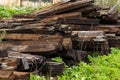 Old wooden railway sleepers. Broken remains of railway.