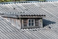 The old wooden roof covered with asbestos cement sheets Royalty Free Stock Photo