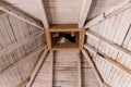 Wooden roof, rafters and chimney. Royalty Free Stock Photo