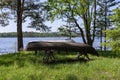 Old wooden row boat in summer sunshine Royalty Free Stock Photo