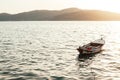 Old wooden row boat at sunset Royalty Free Stock Photo