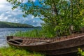 Old wooden rowing boat on the shore of the Saimaa lake in Finland - 11 Royalty Free Stock Photo