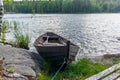 Old wooden rowing boat on the shore of the Saimaa lake in Finland - 14 Royalty Free Stock Photo